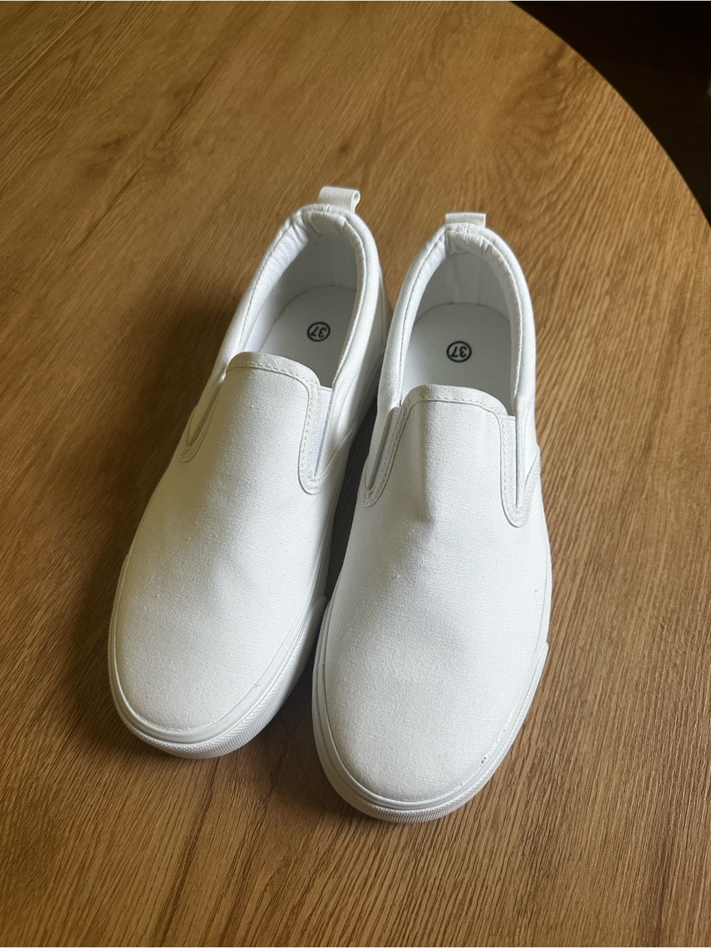 Women’s White Slip-On Canvas Shoes